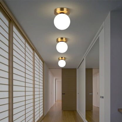 Plafonnier Boule en Verre Doré ou Noir | Lumo